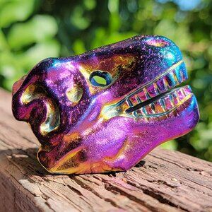 (#4) NEW 2.25" x 1.5" AURA COATED DINO HEAD